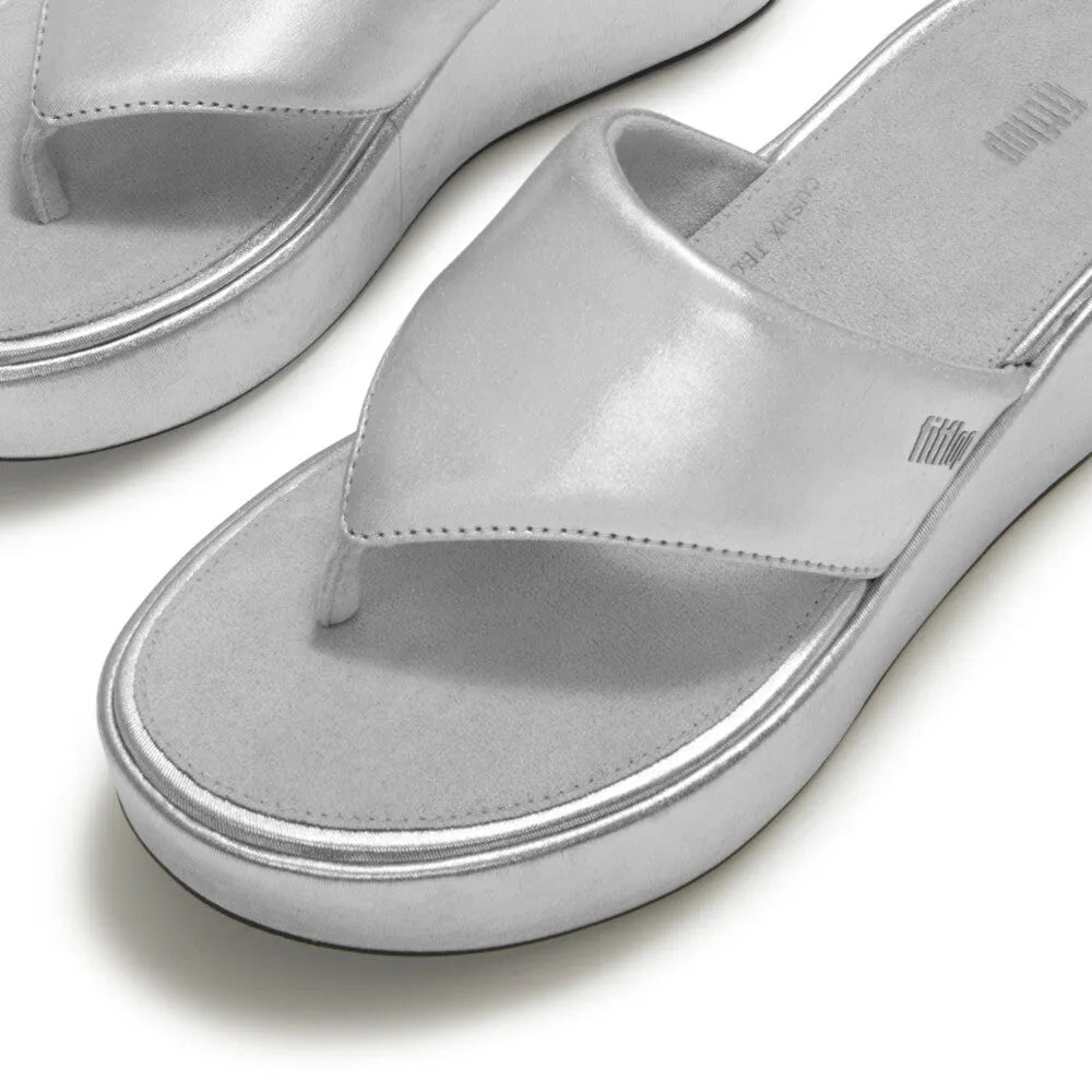 FitFlop JF8-011 platform wedge women's silver textile T-bar sandals with chunky soles and open toe design.