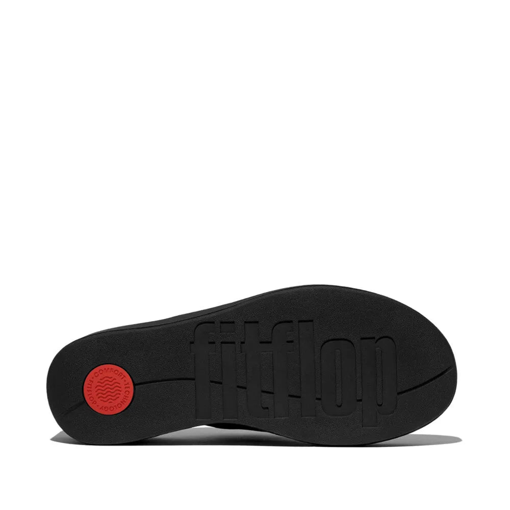 FitFlop JF8-090 women's narrow black slip-on platform sandals with cushioned sole and embossed logo.