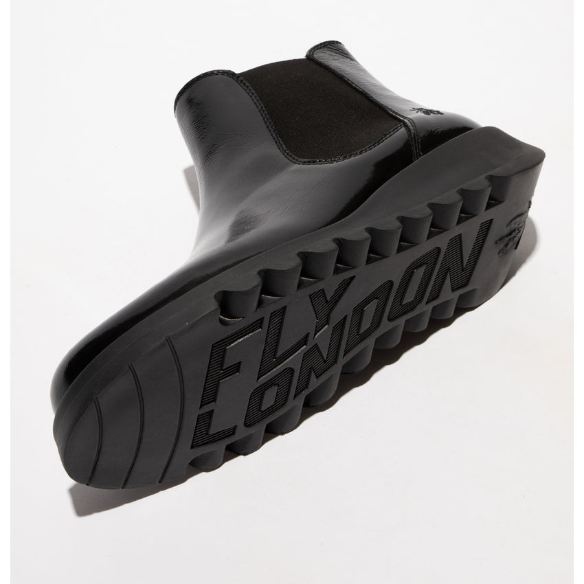 Fly SALV195FLY women's black patent leather ankle boots with pull-on design and thick rubber sole featuring 