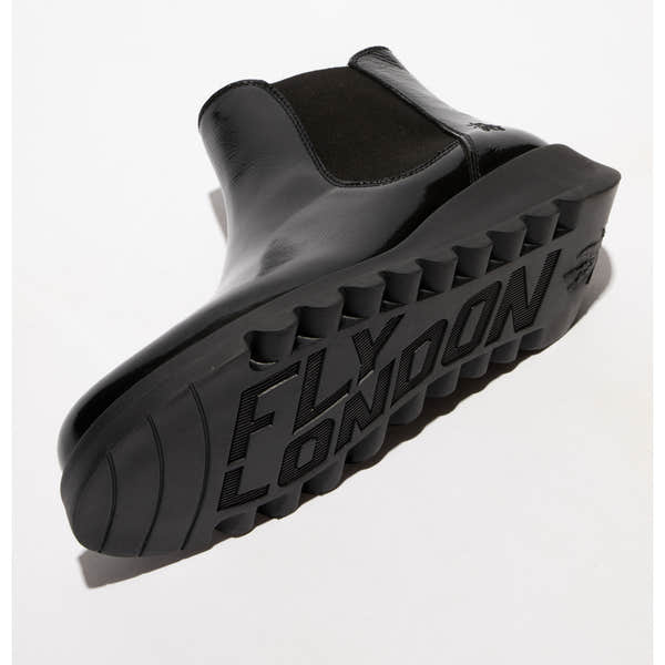 Fly SALV195FLY women's black patent leather ankle boots with pull-on design and thick rubber sole featuring "FLY LOOP" embossing.