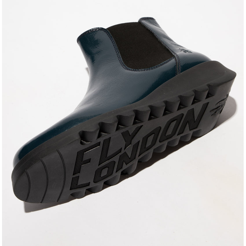Fly SALV195FLY ladies navy patent leather pull-on ankle boots with rugged sole and branding outsole.