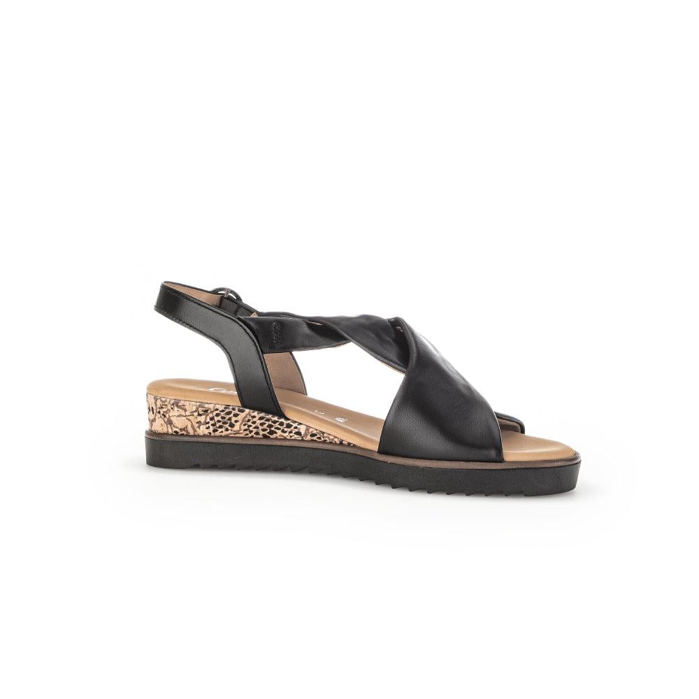 Gabor 62.751.27 black leather buckle sandals with twisted strap detail and snake print wedge heel.