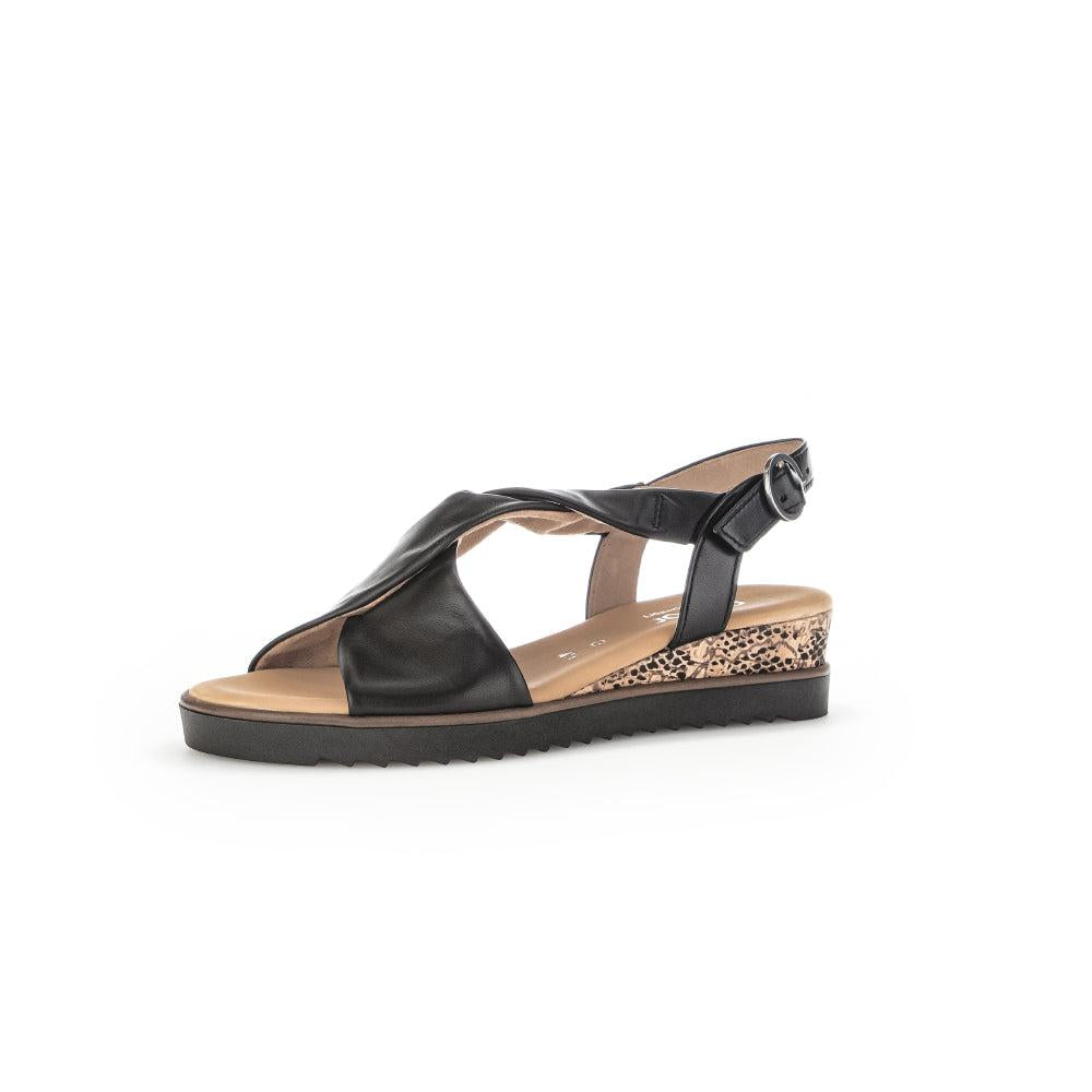 Gabor women's black leather buckle sandals with leopard print wedge heel, open toe, and ankle strap.