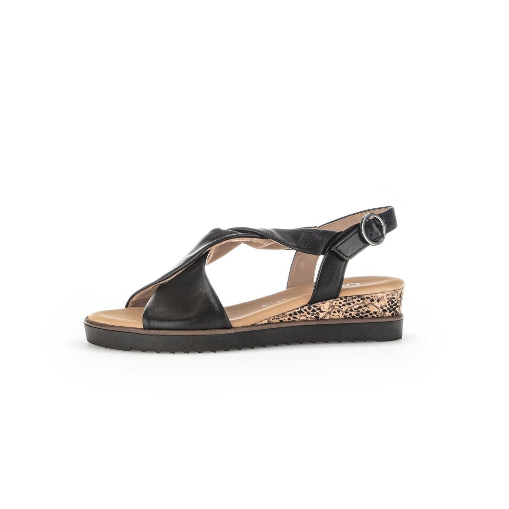 Gabor women's black leather buckle sandals with a leopard print wedge, open toe, and ankle strap.