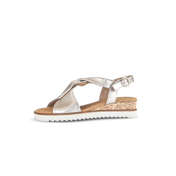 Gabor women's beige leather buckle sandals with cork wedge heel and white rubber sole.