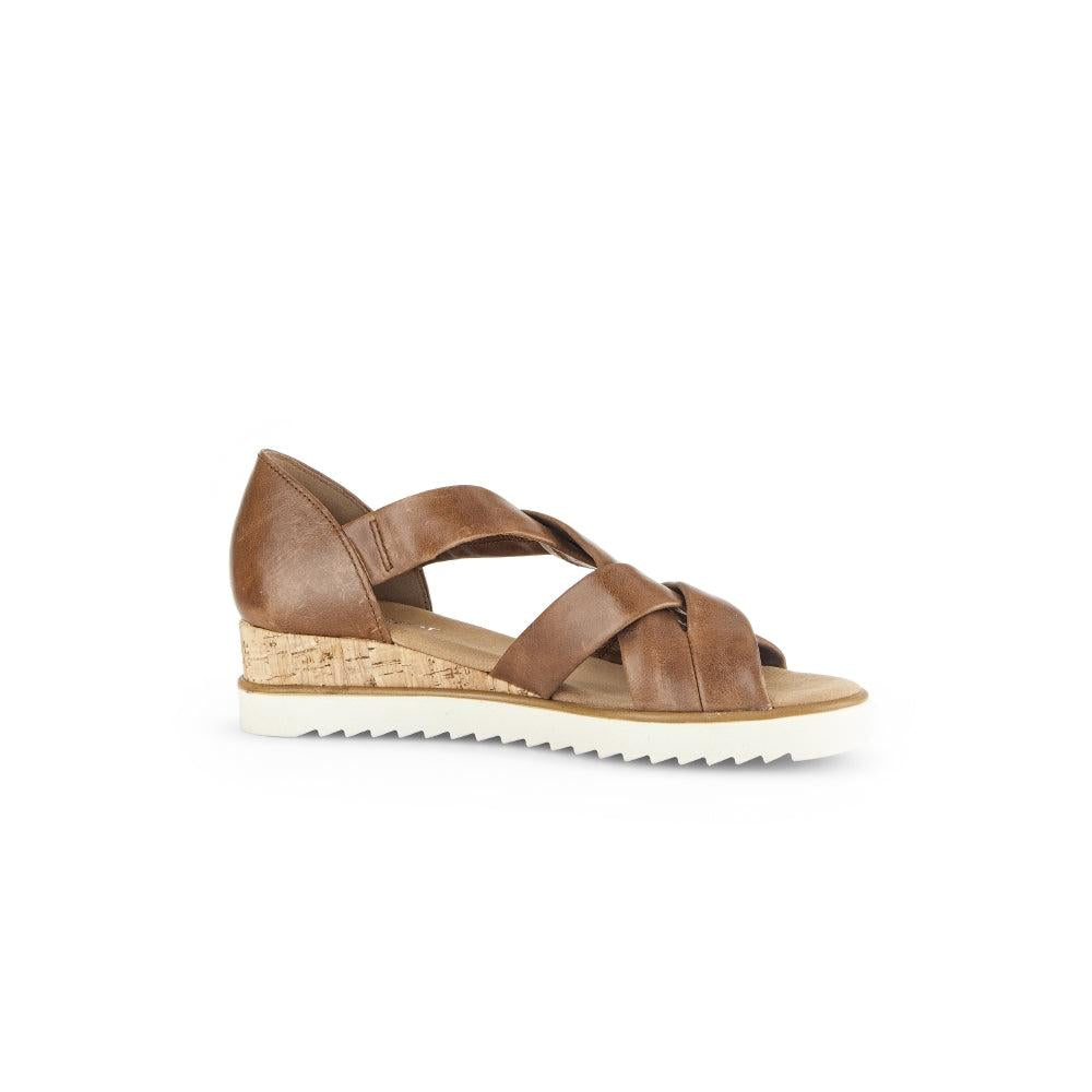 Gabor women's brown leather slip-on sandal with knotted straps, cork heel, and white ridged sole.