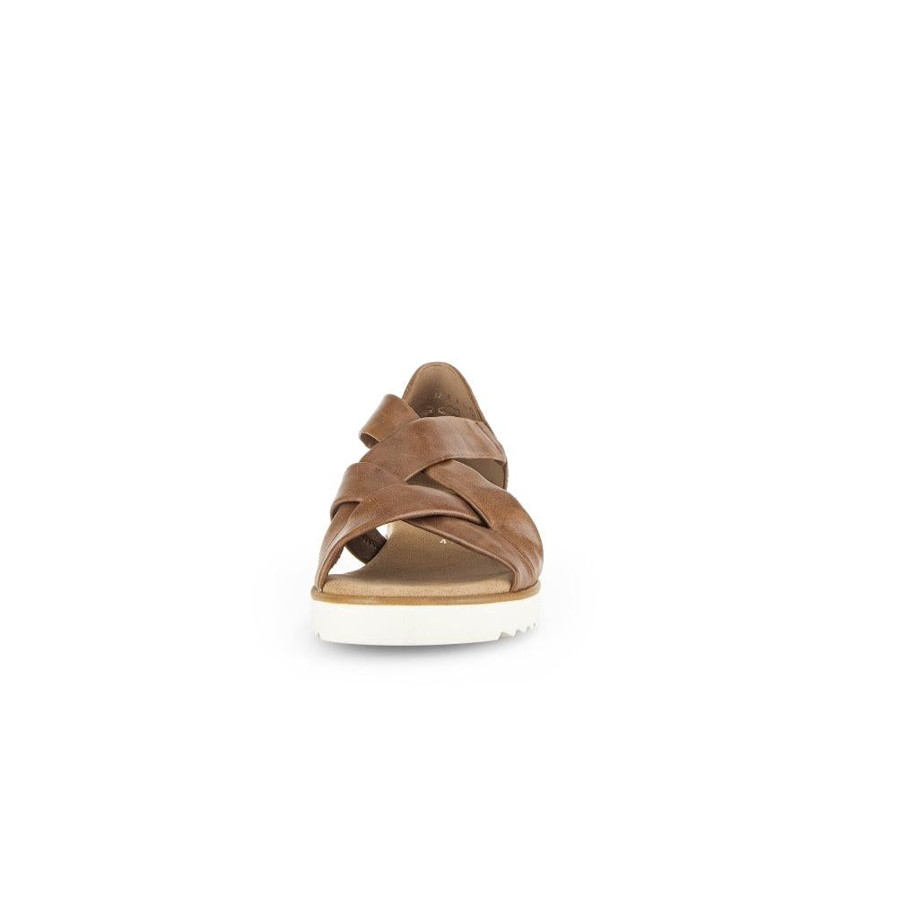 Gabor women's brown leather slip-on sandals with crisscross straps and white sole.