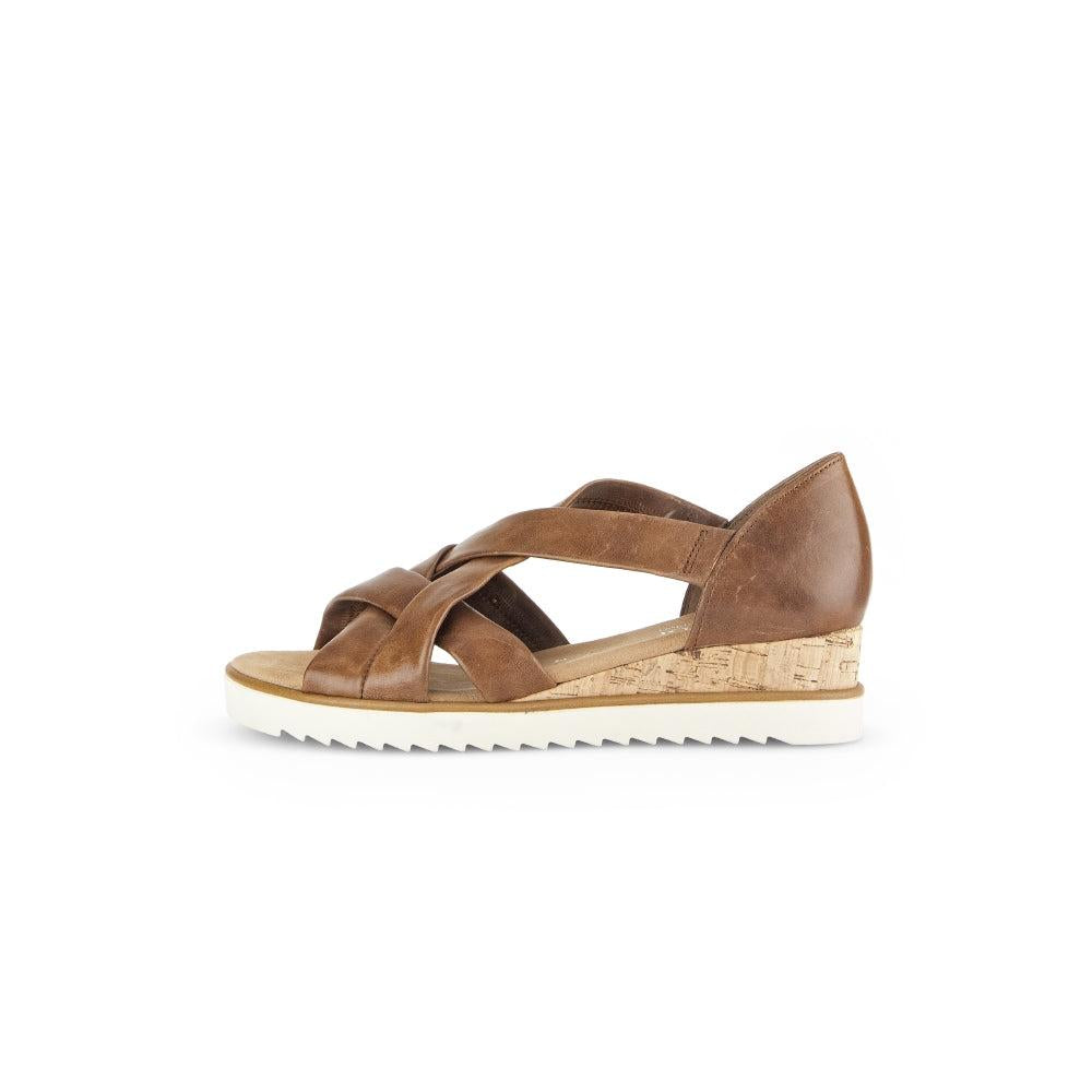 Gabor women's brown leather slip-on sandals with crossover straps and cork wedge heel.