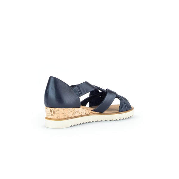 Gabor women's navy leather slip-on sandals with cork wedge heel and white rubber sole.