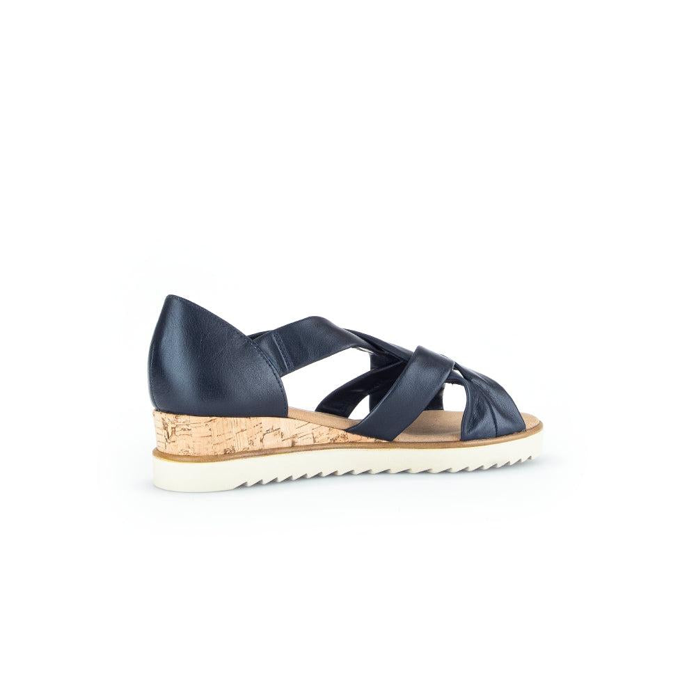 Gabor women's navy leather slip-on sandals with cork heel and white rubber sole.