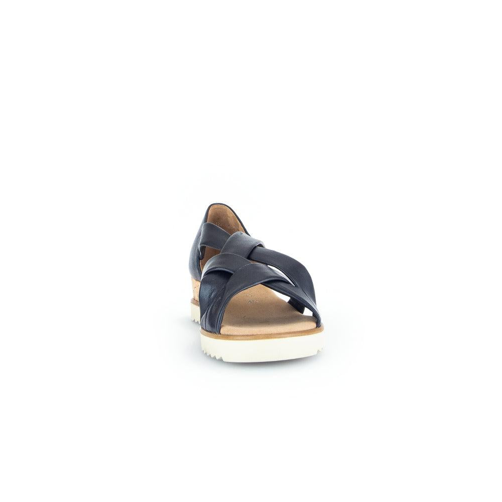 Gabor women's navy leather slip-on sandals with crisscross straps and white rubber sole.