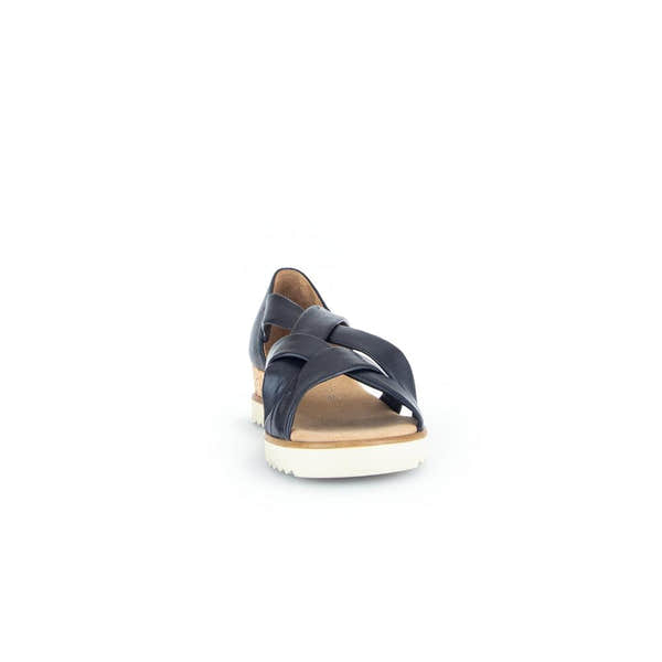 Gabor women's navy leather slip-on sandals with crisscross straps and white rubber sole.