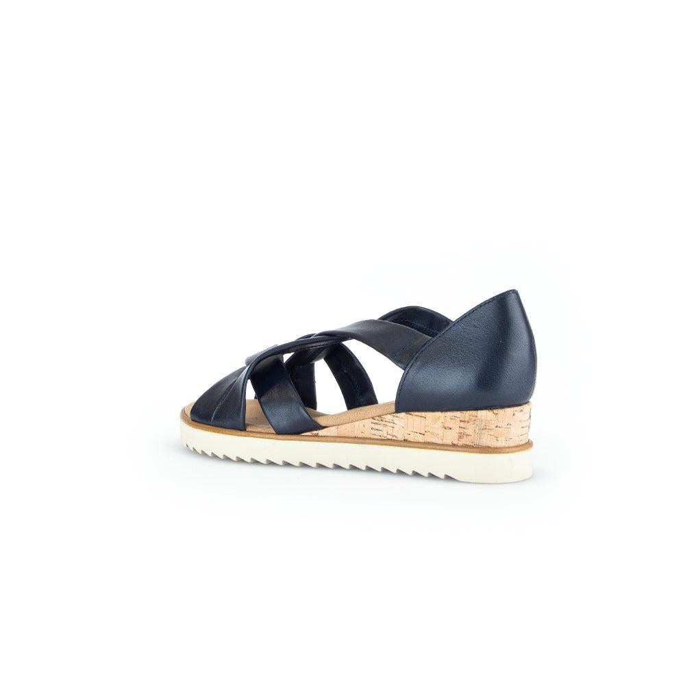 Gabor women's navy leather slip-on sandals with cork wedge heel and white ridged sole.