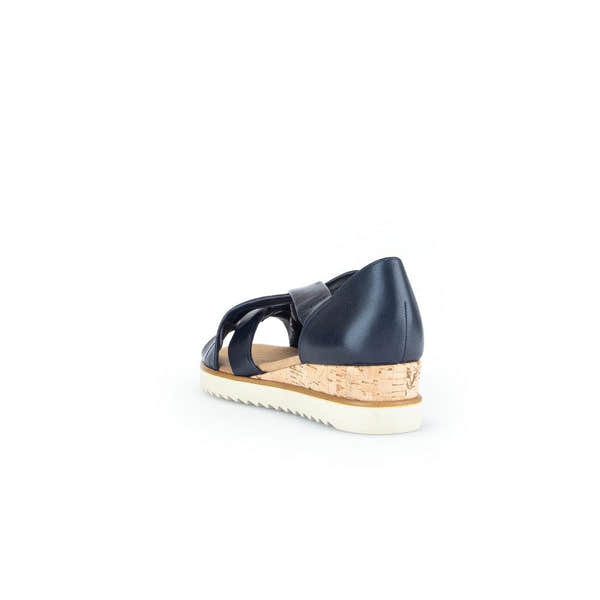 Gabor women's navy leather slip-on sandals with cork wedge and white rubber sole.