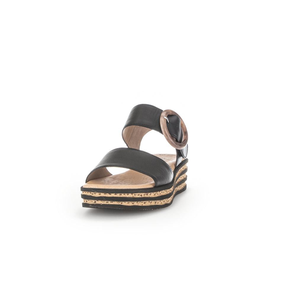 Gabor André ladies black leather touch fastening sandals with layered cork and rubber sole.
