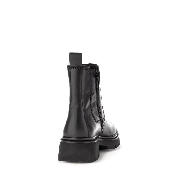 Black waxed leather side zip ankle boots with chunky sole and pull tab, stylish and durable women's footwear.