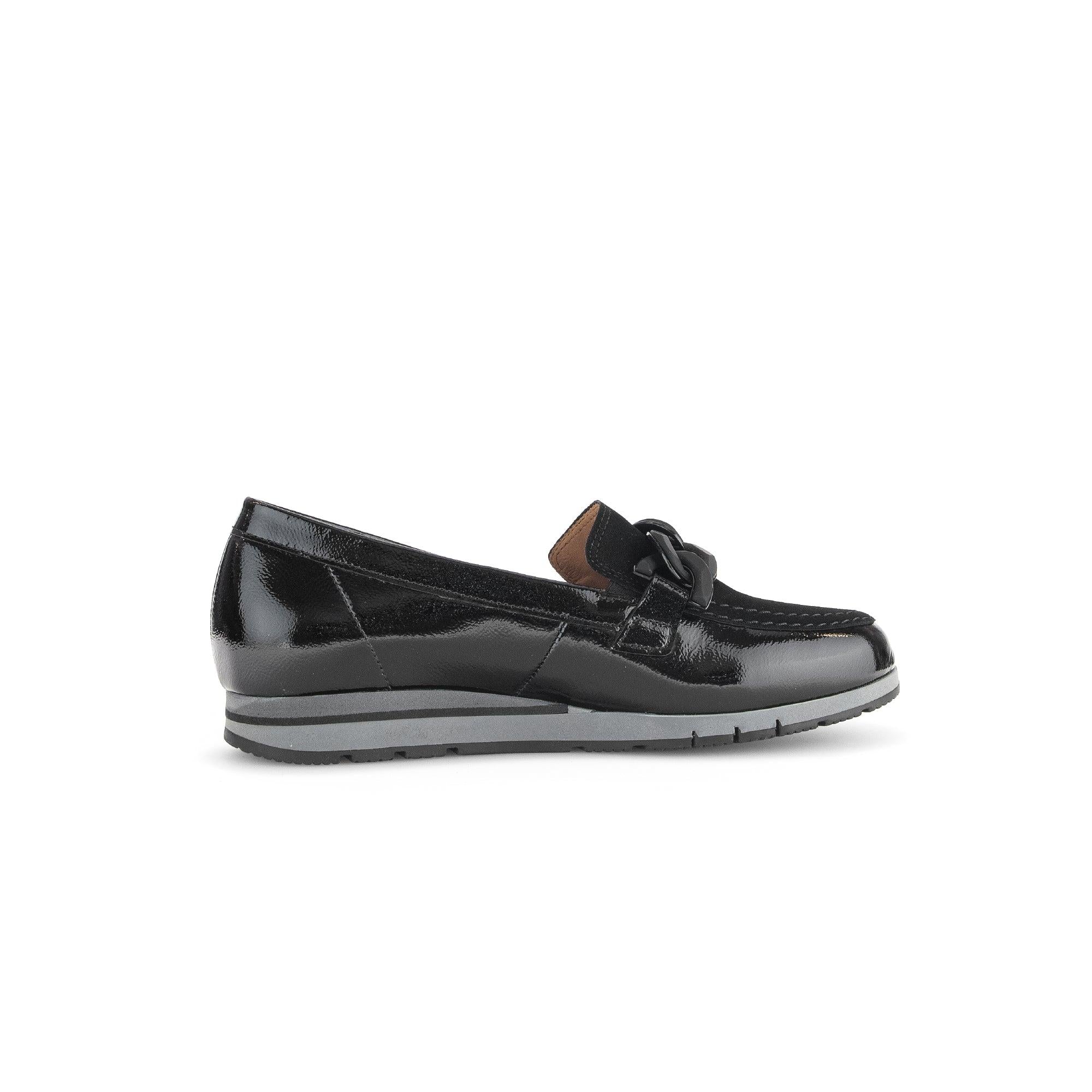 Gabor Bea women's black patent leather slip-on loafers with rubber outsole and decorative bow detail.