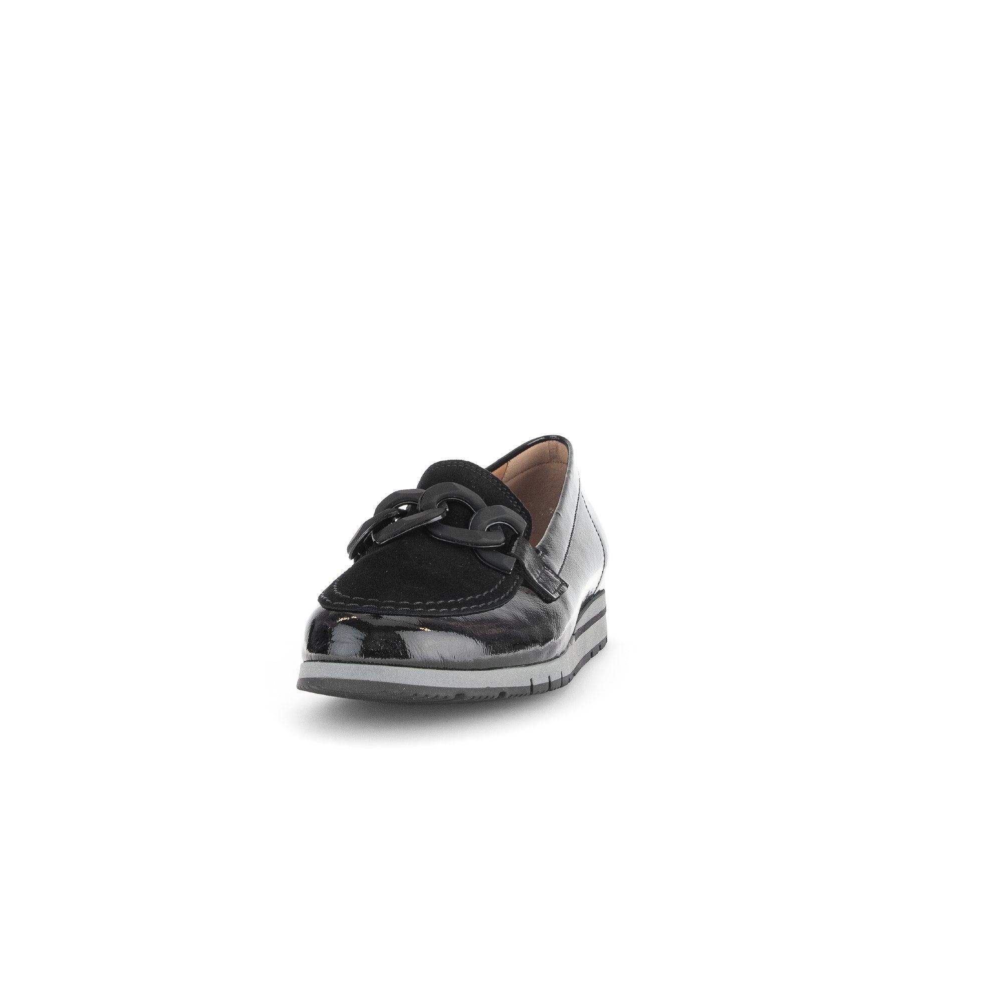 Gabor Ladies Black Patent Leather Slip-On Loafers with Chain Detail, Cushioned Sole, and Rounded Toe for Comfort and Style.
