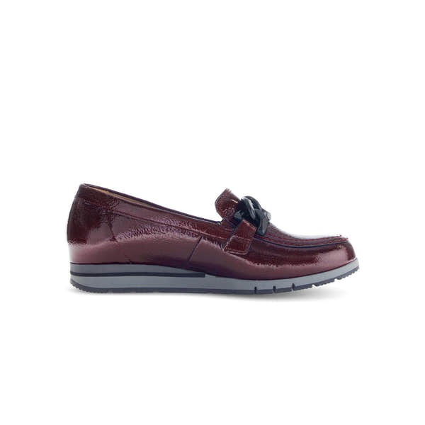 Gabor Bea ladies burgundy red and black grained patent leather slip-on loafers with decorative black chain detail.