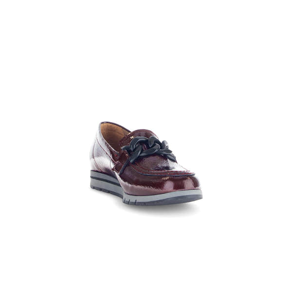Gabor women's burgundy red and black grained patent leather slip-on loafers with chunky black chain detail.