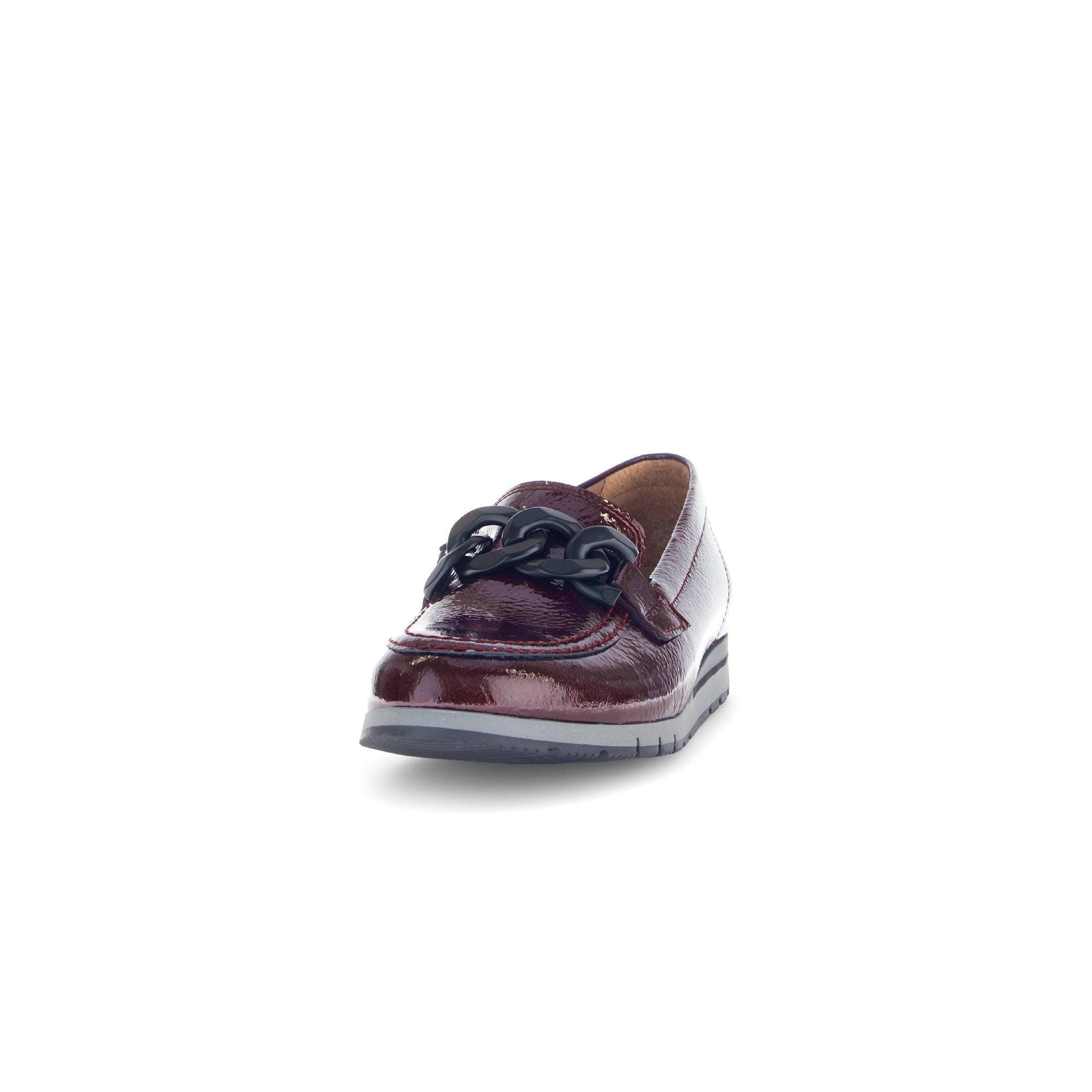 Gabor women's burgundy red and black patent leather slip-on loafers with chain detail and low heel.