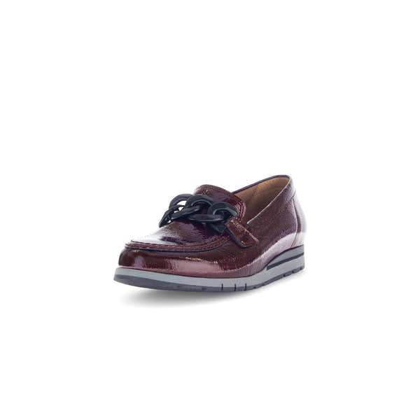 Gabor burgundy red and black grained patent leather slip-on loafers with chain detail and rubber sole.