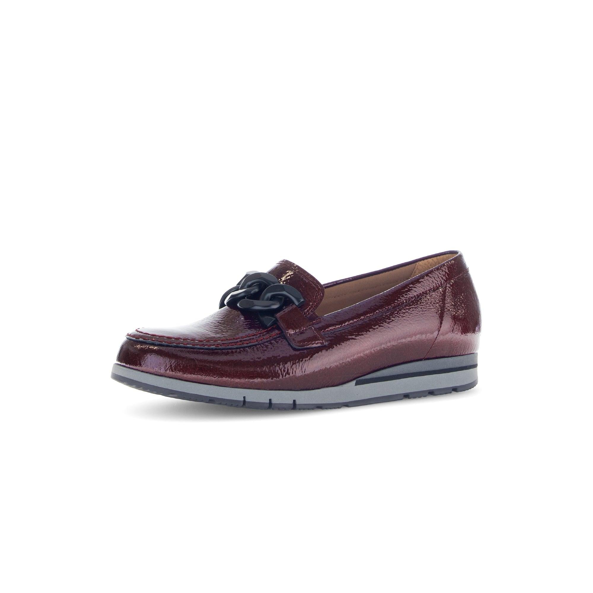 Gabor Beas burgundy and black patent leather slip-on loafers with chain detail, cushioned sole, and gaiter sole.