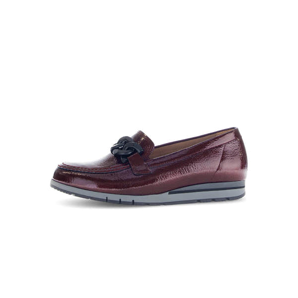 Gabor women's burgundy red and black grained patent leather slip-on loafers with chain detail and cushioned sole.