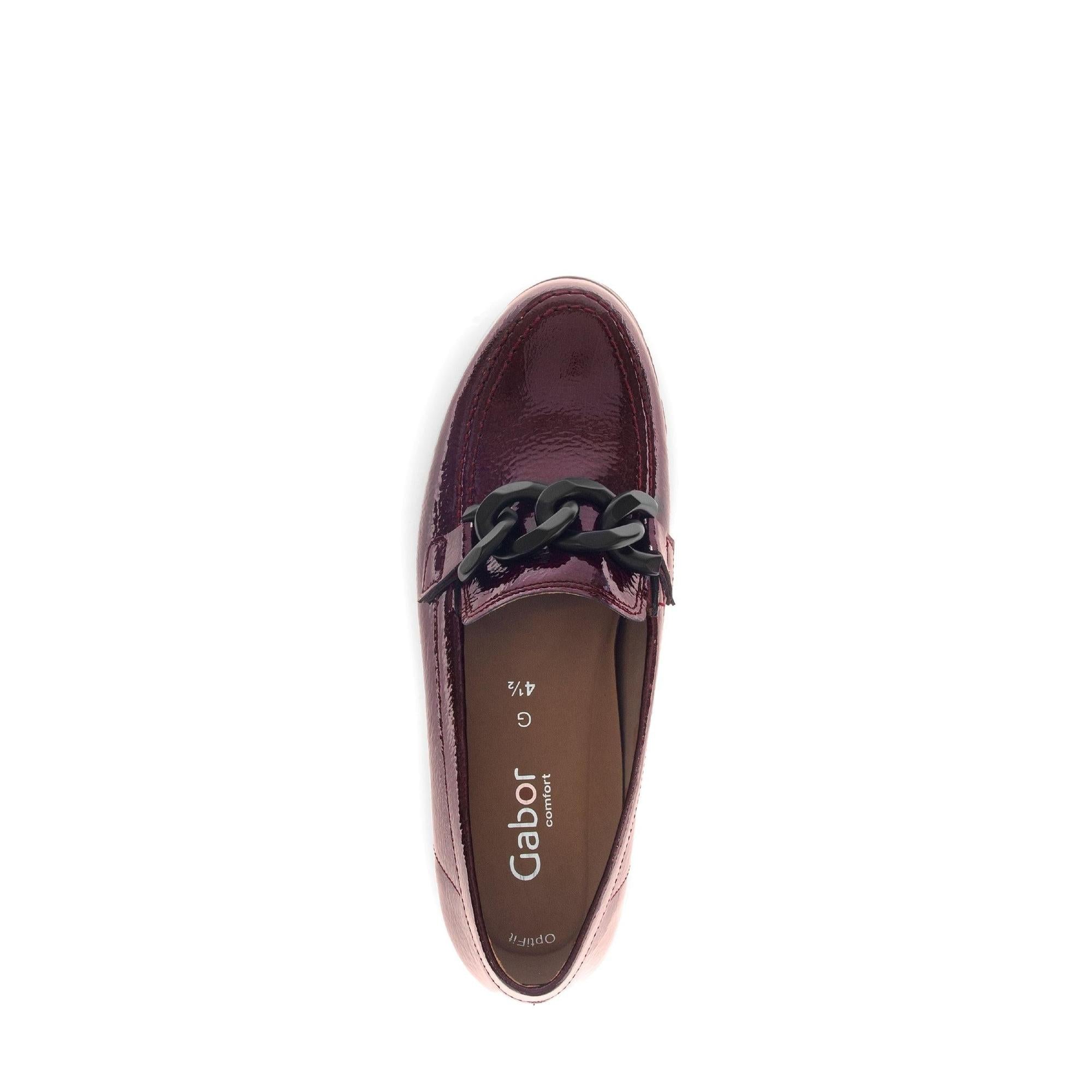 Gabor burgundy red and black patent leather slip-on loafers with chain detail for women.