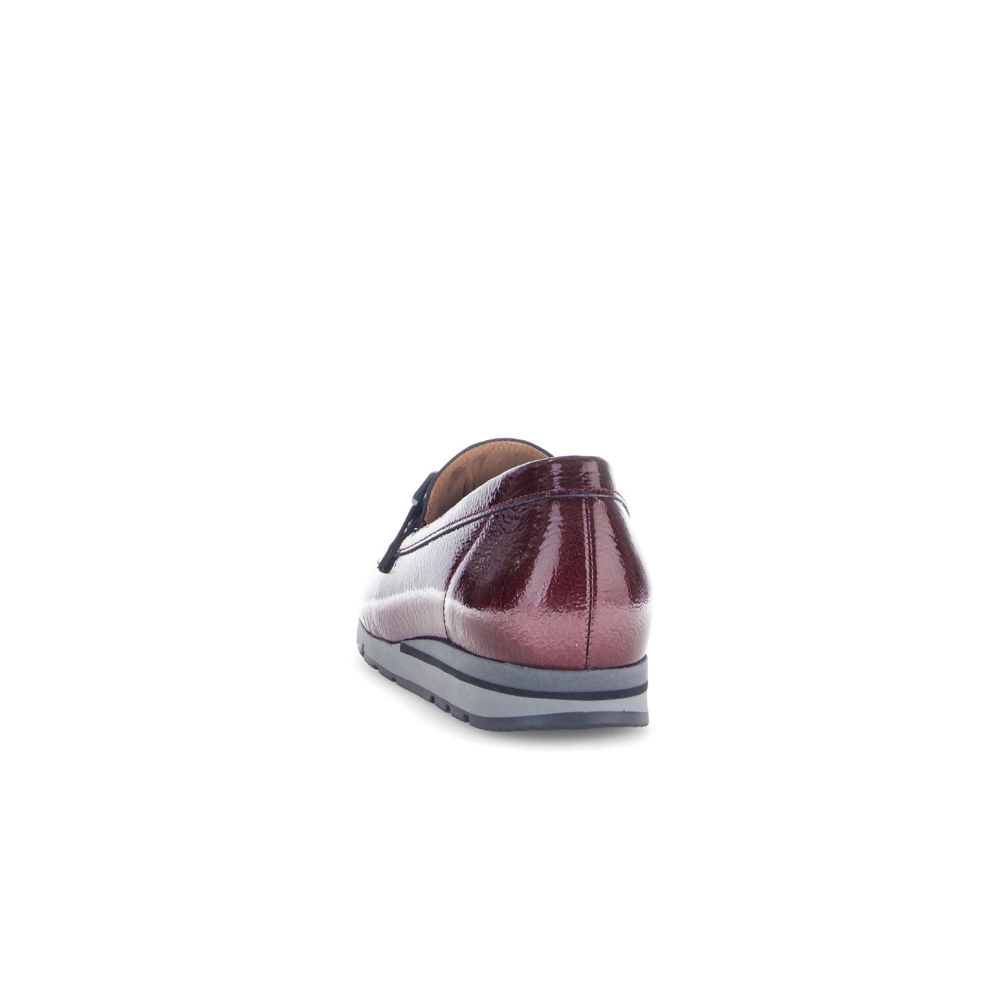 Gabor women's slip-on loafers in burgundy and black grained patent leather, with a sporty sole, back view.