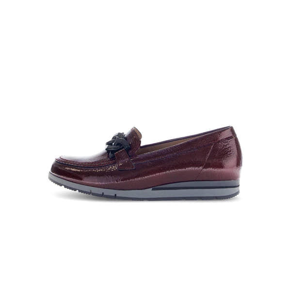 Gabor women's burgundy and black patent leather slip-on loafers with decorative chain detail and comfortable gray sole.