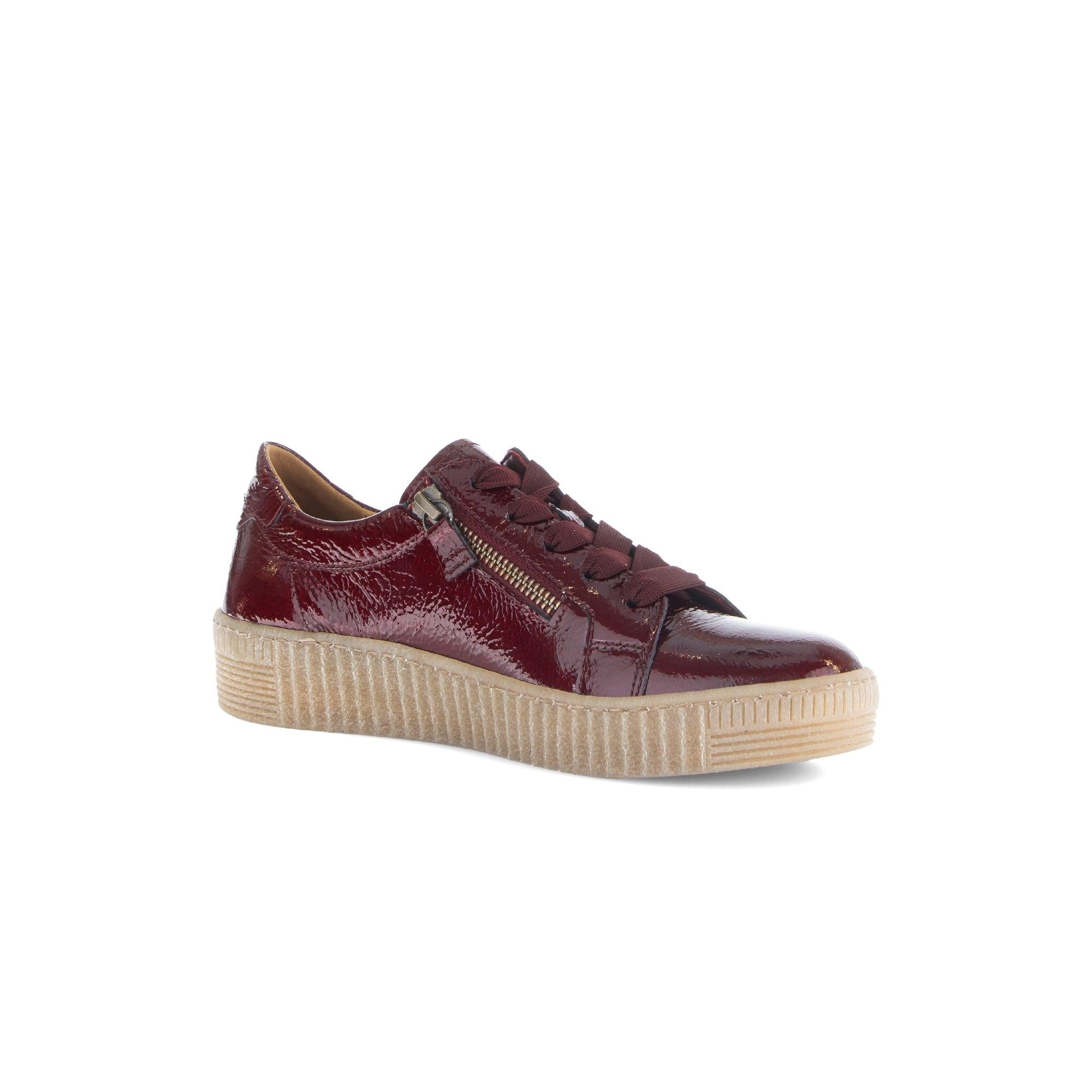 Gabor women's burgundy leather trainers with zip and lace-up closure, padded ankle, and chunky beige rubber sole.