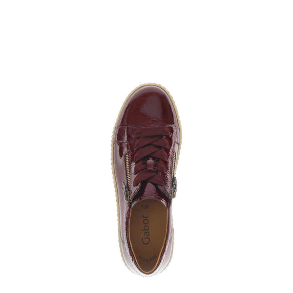 Gabor ladies' bordo red leather trainers with zip and lace-up closure, Fashion sneakers with glossy finish and beige sole.