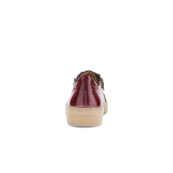 Gabor ladies' bordo red leather trainers with zip and lace details, featuring a chunky beige sole.