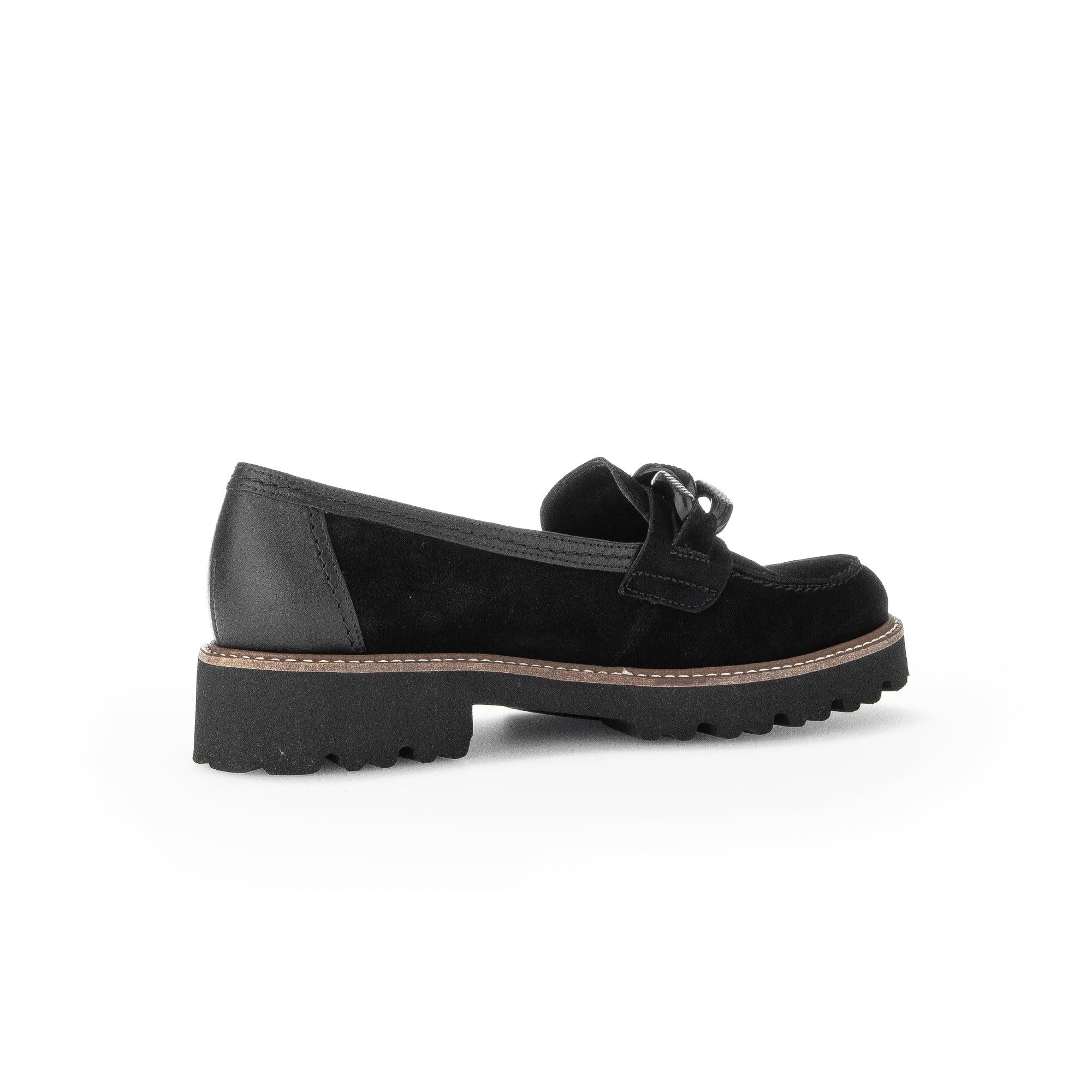 Gabor ladies' black suede slip-on loafers with chunky rubber sole and decorative bow detail.