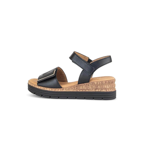 Gabor ladies' black leather touch fastening sandals with cork wedge sole and chunky black rubber outsole.