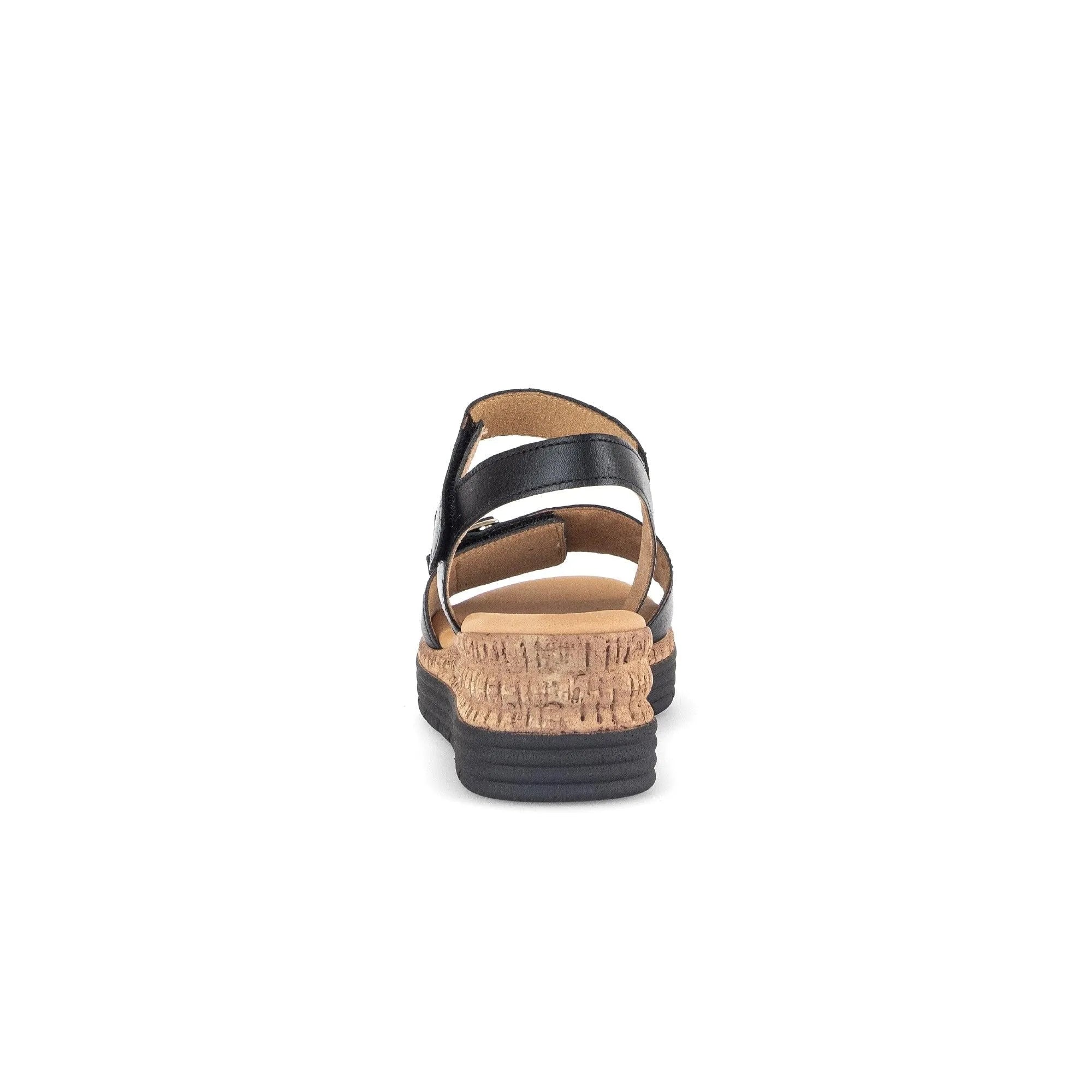 Black leather touch fastening sandals with cork wedge, showcasing a simple strappy design for comfort and style.
