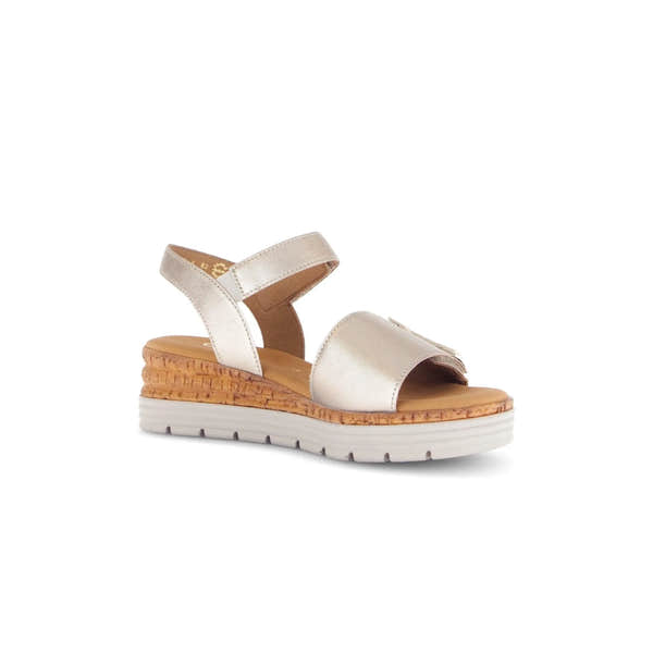 Beige leather touch fastening women's sandals with cork wedge sole and white rubber outsole.