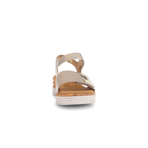 Beige leather touch fastening sandals with buckle detail, angled view, white sole, and cushioned footbed.