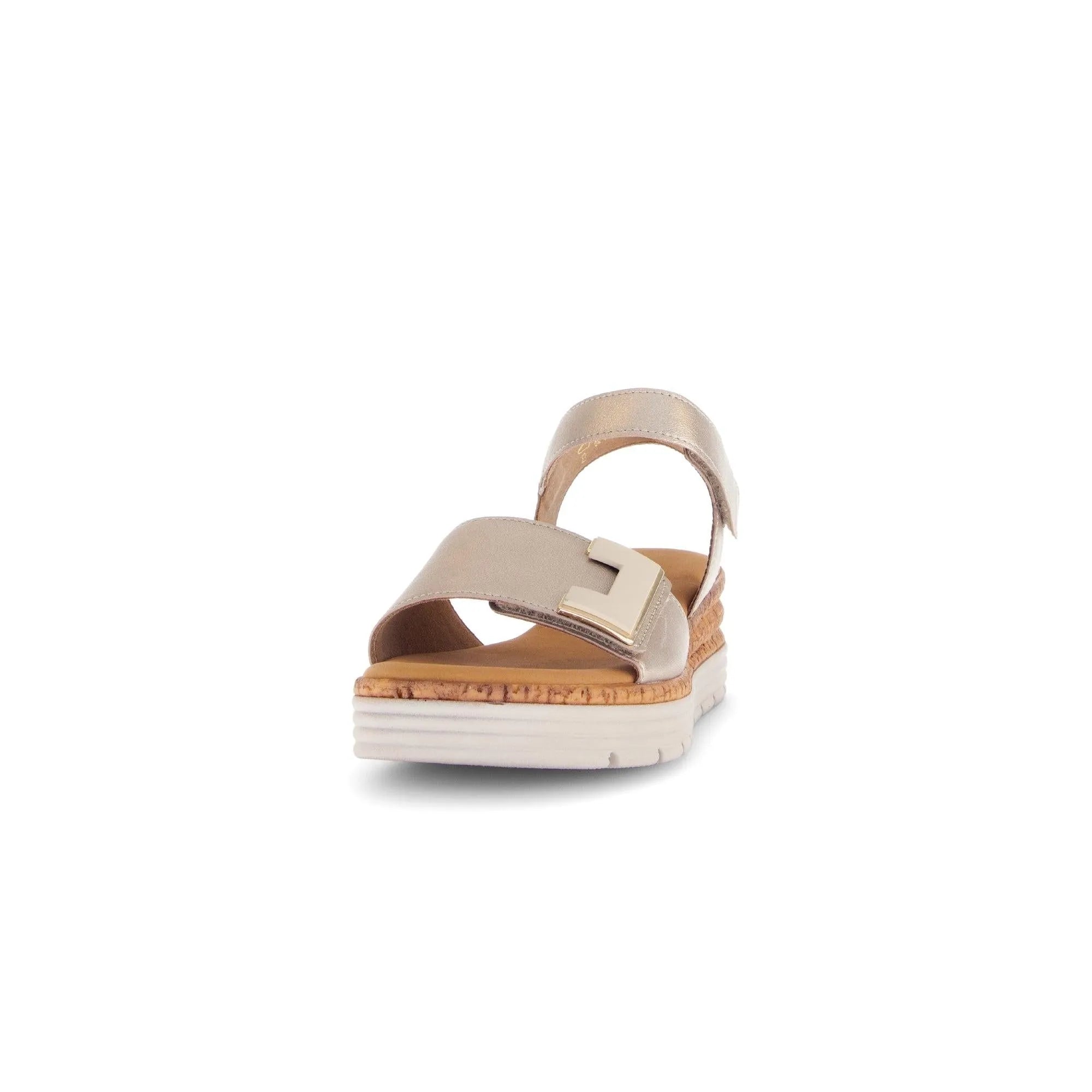 Beige leather touch fastening ladies' sandals with a chunky white sole and large decorative buckle.