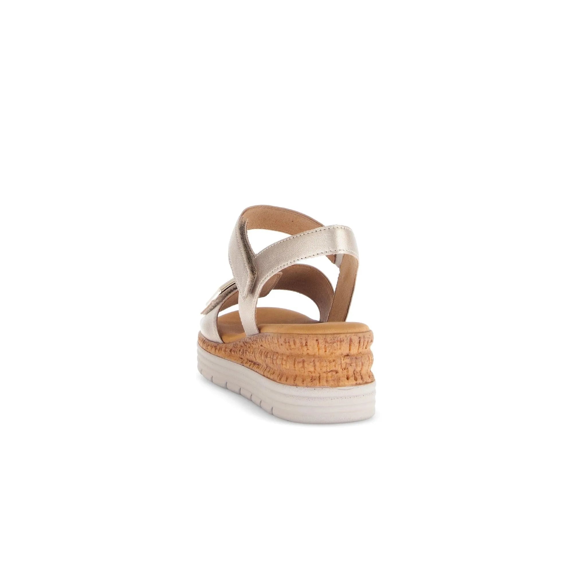 Beige leather sandals with touch fastening, cushioned footbed, and textured wedge heel for comfort and style.