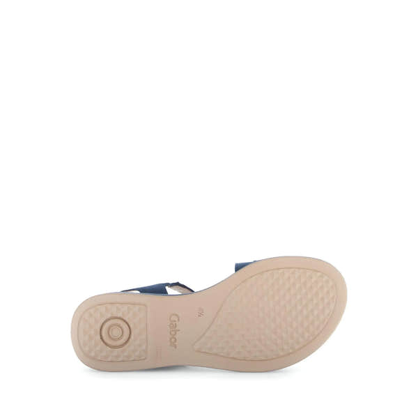 Blue nubuck sandals with touch fastenings, cushioned sole, and textured beige outsole for women.