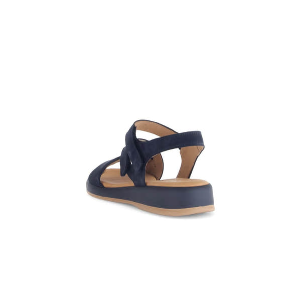 Blue nubuck sandals with touch fastening, open design, and a low wedge heel for comfort and style.