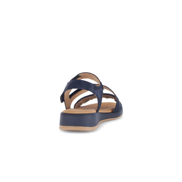 Blue nubuck touch fastening sandal with beige insole and black sole, styled for women.