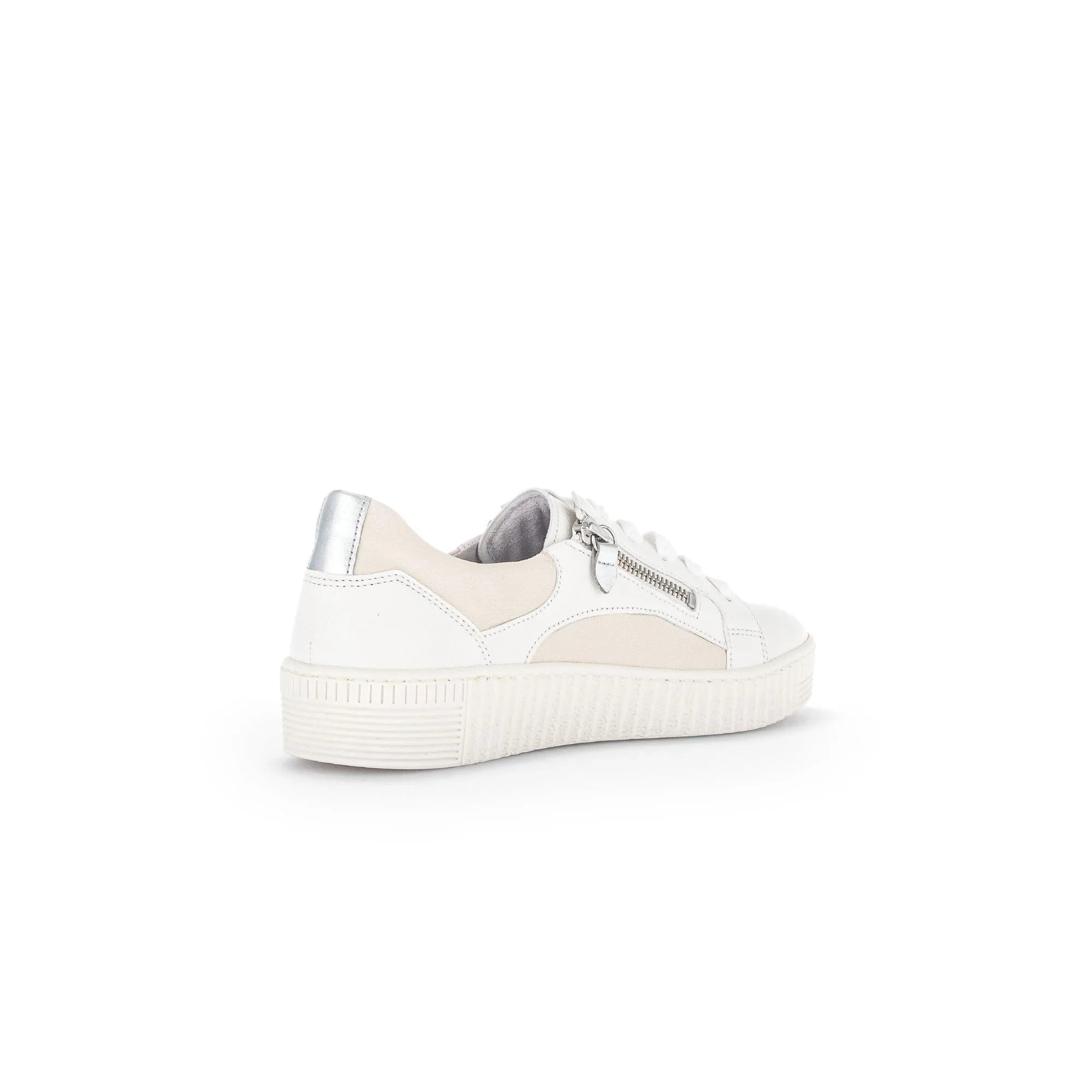 White leather and beige fabric lace-up trainers with silver zip detail and chunky rubber sole.
