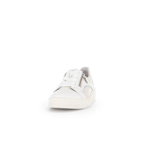 White leather women's lace-up trainer with side zipper, lace detailing, and a chunky rubber sole.