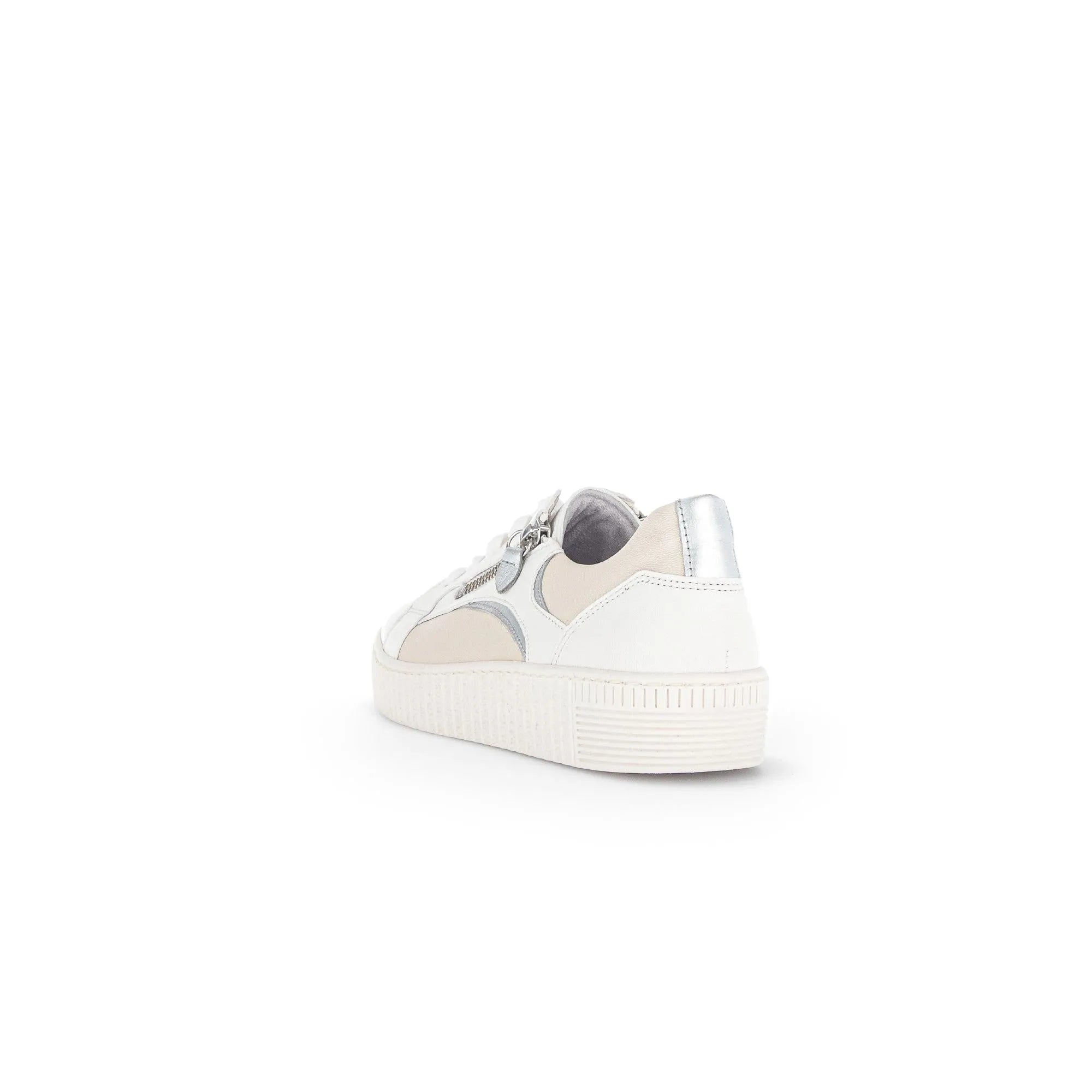 White and latte leather trainers with zip and lace detailing, featuring a silver heel accent and textured sole.