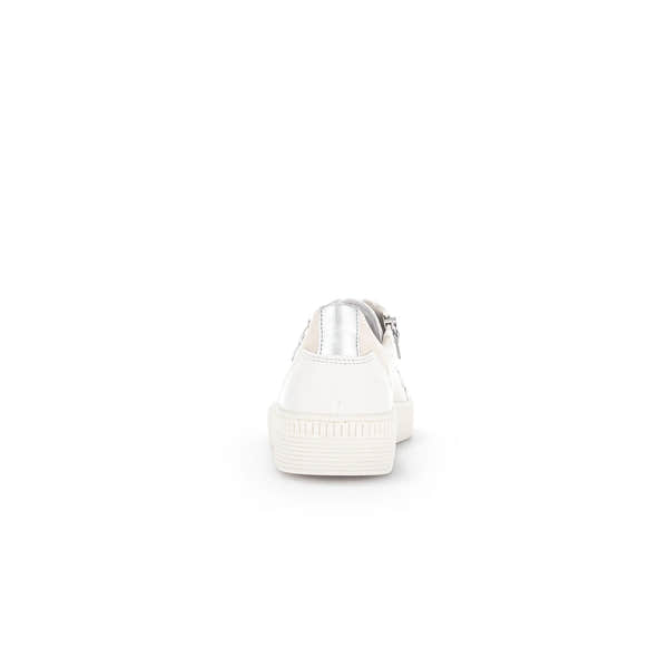 White leather zip and lace trainers with silver accents and textured sole, designed for ladies. Stylish and versatile.
