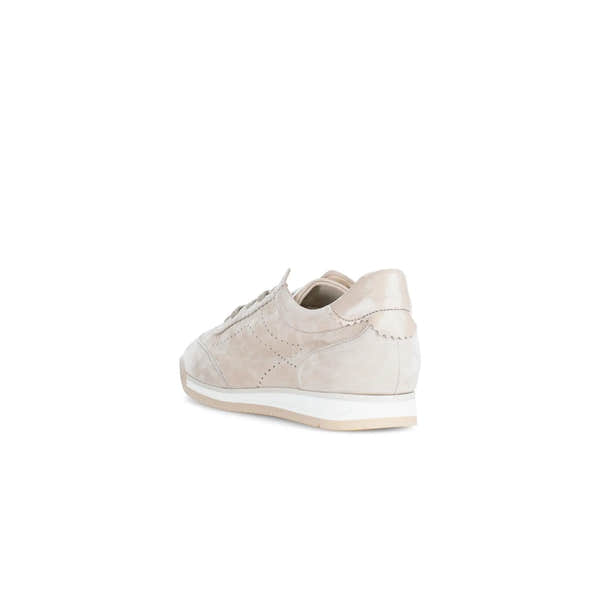 Beige leather lace-up trainer with suede and patent heel detail, white sole, and stitching accents.