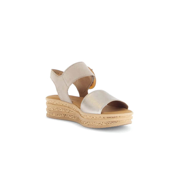 Beige leather touch fastening wedge sandal with layered cork-style sole and open toe design.